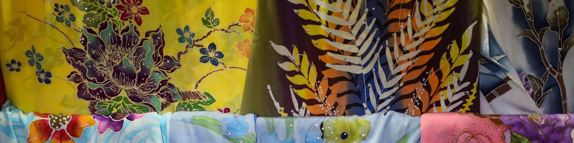 Selection of Malaysia batik in silk fabric on display in Pasar Payang, Kuala Terengganu, Malaysia.