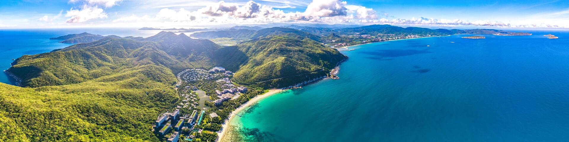 Coastal Scenery of Luxury Resort with Villas, Yacht Marina and Recreational Beach at Yalong Bay, Sanya, Hainan Island, a Tourism Destination for Summer Vacation in China, with Tropical Climate.