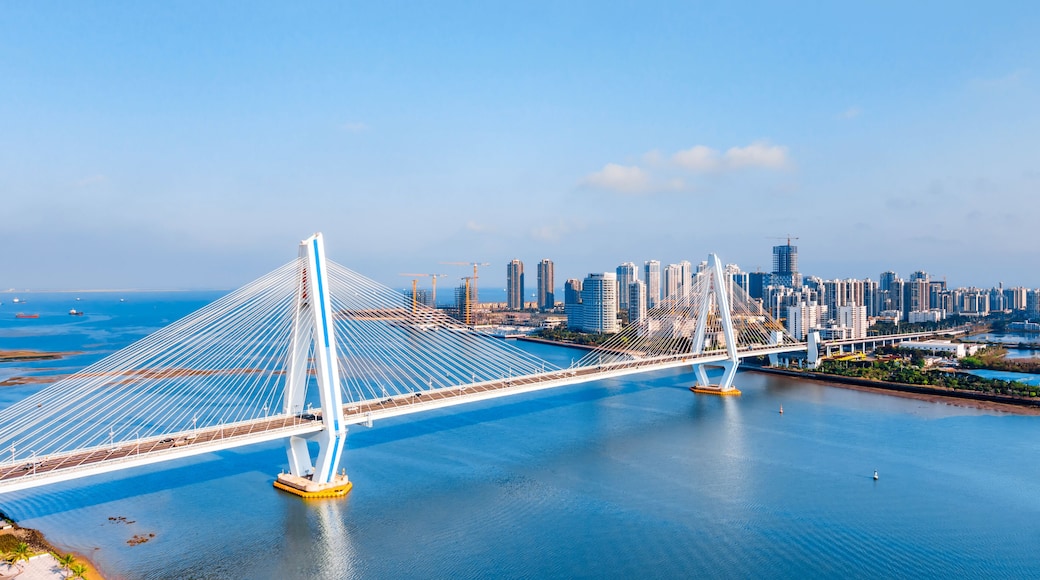 High view sunny day scenery of Century Bridge on Haidian River, Haikou, Hainan, China
