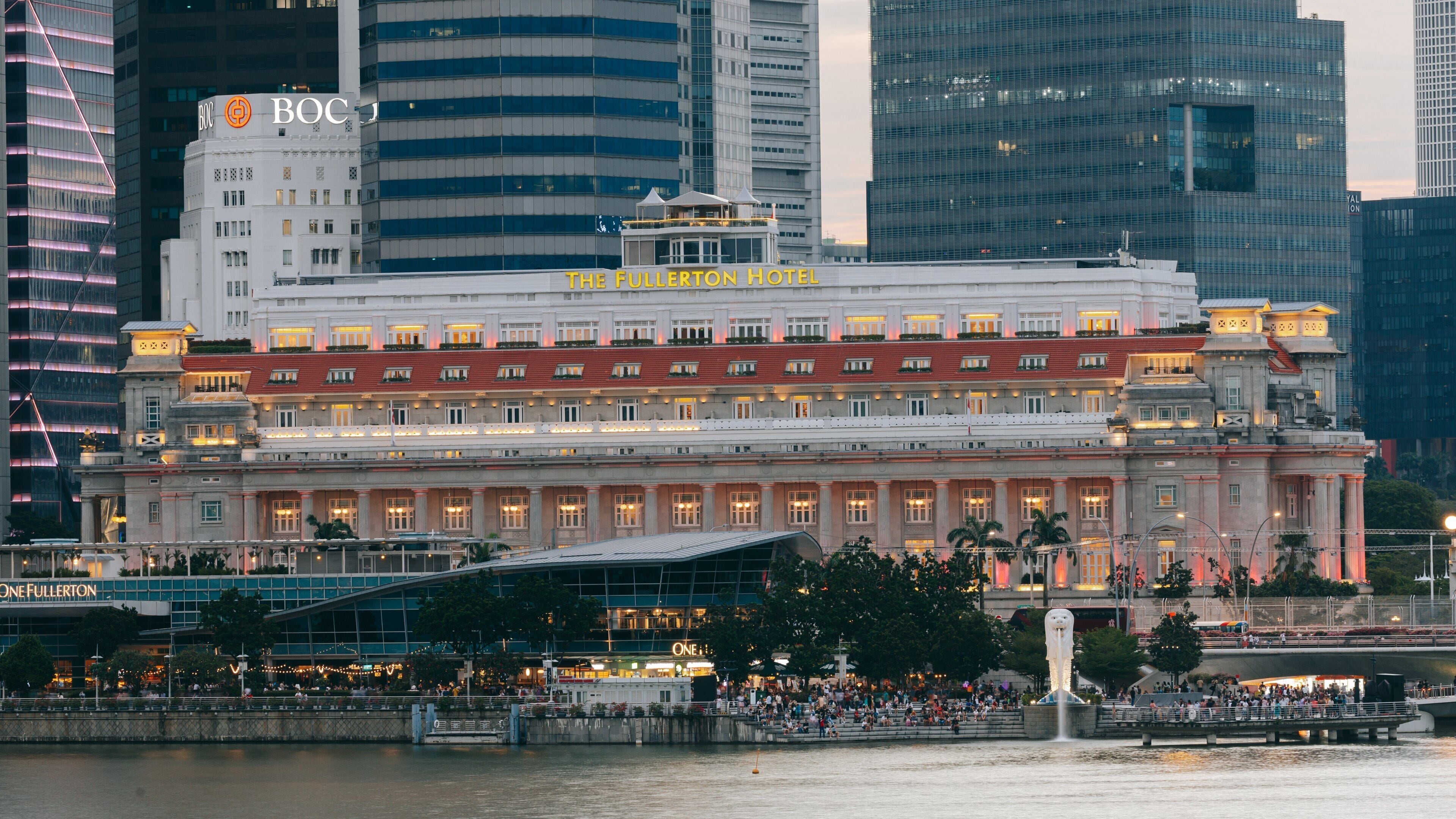 Helix Bridge showing heritage architecture, a bay or harbor and a city