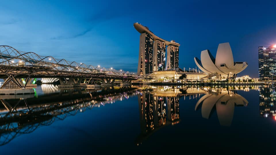 Helix Bridge featuring night scenes, modern architecture and a bay or harbor