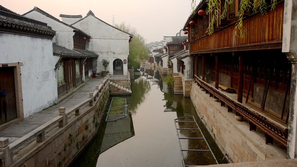 Jiaxing featuring heritage architecture, a small town or village and a river or creek