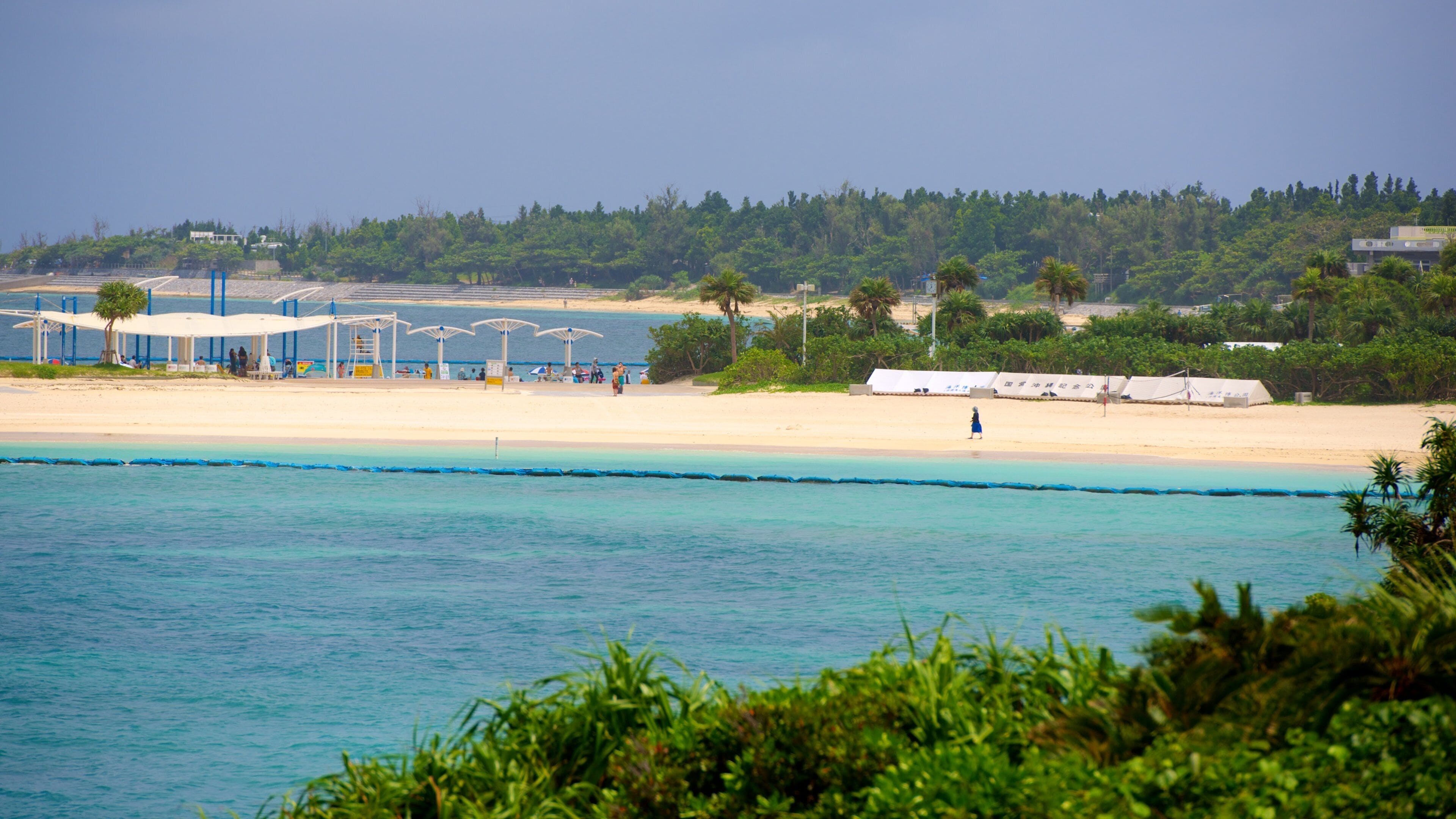 Okinawa which includes general coastal views and a sandy beach