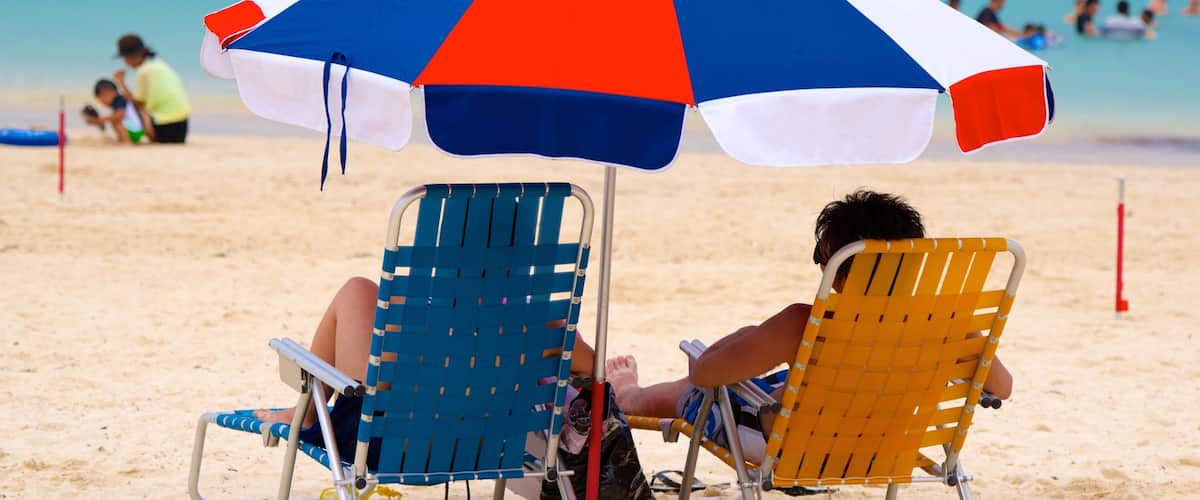 Okinawa which includes a sandy beach