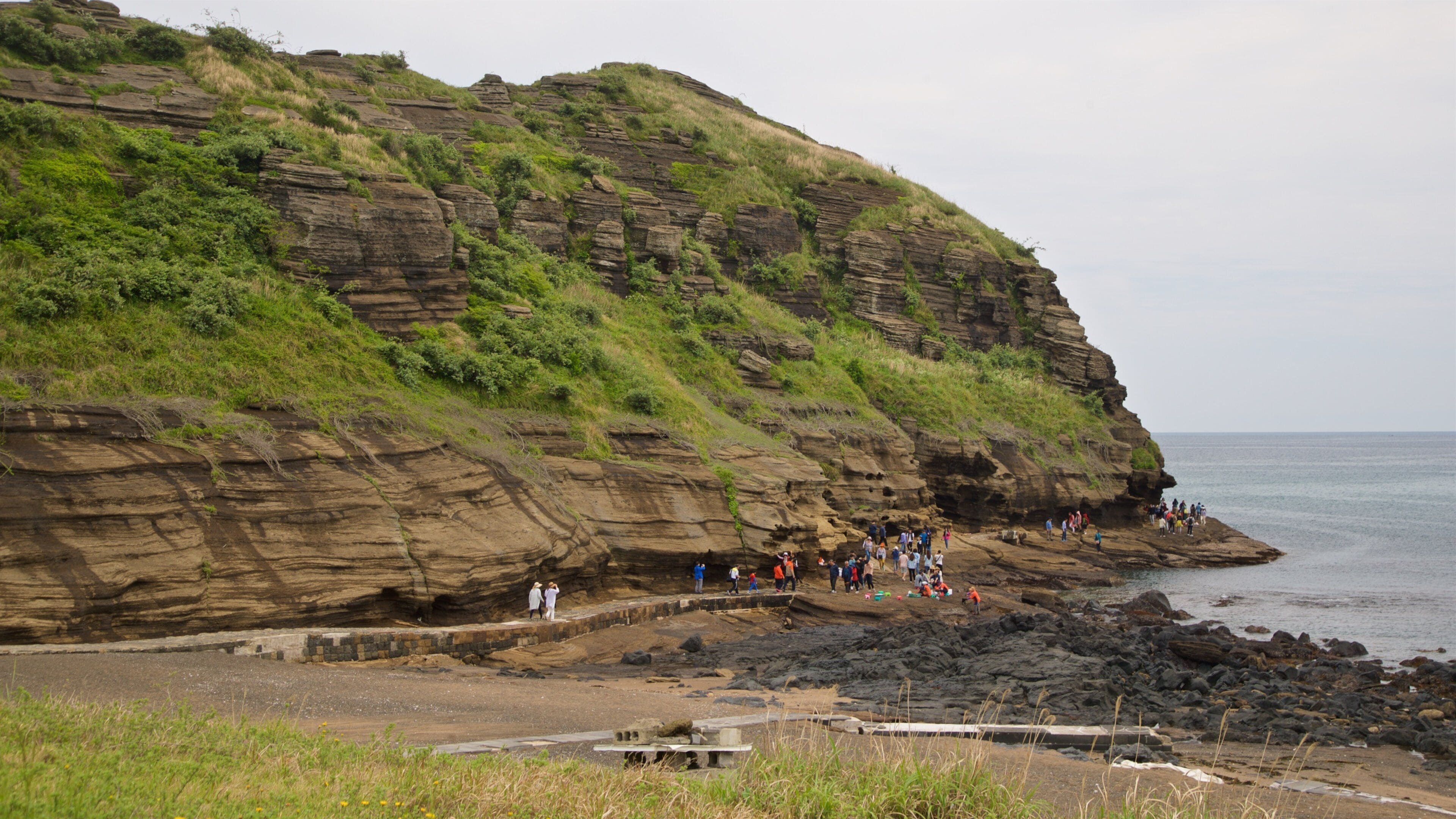 Yongmeori Coast which includes general coastal views and rocky coastline
