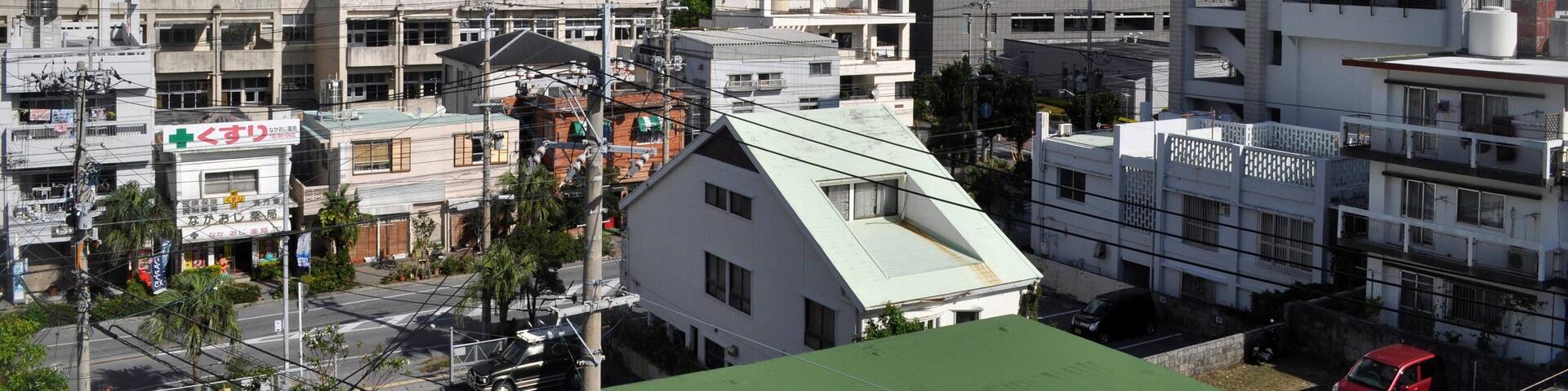 FCHXF7 Naha, Okinawa, Japan: Okinawa Prefectural Office and view on Kencho-mae