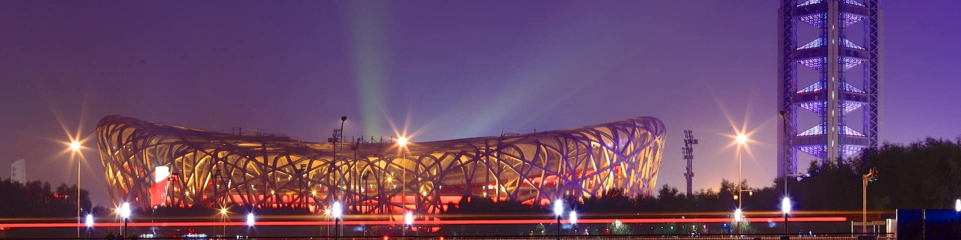 Olympic Green featuring night scenes and modern architecture