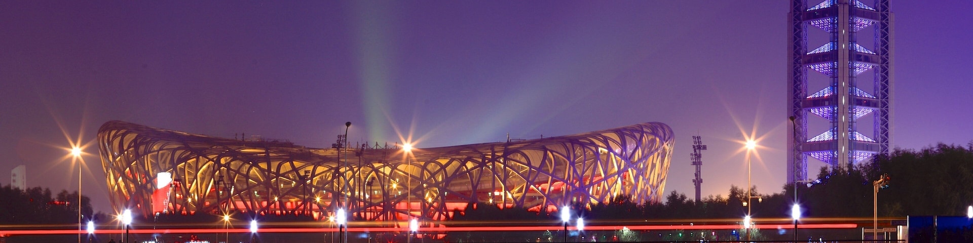Olympic Green featuring night scenes and modern architecture