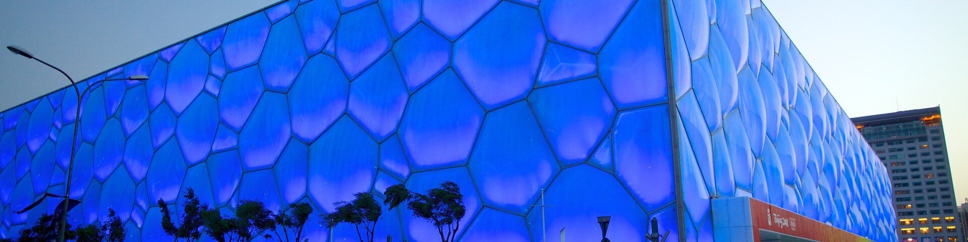 Olympic Green featuring a sunset, street scenes and modern architecture