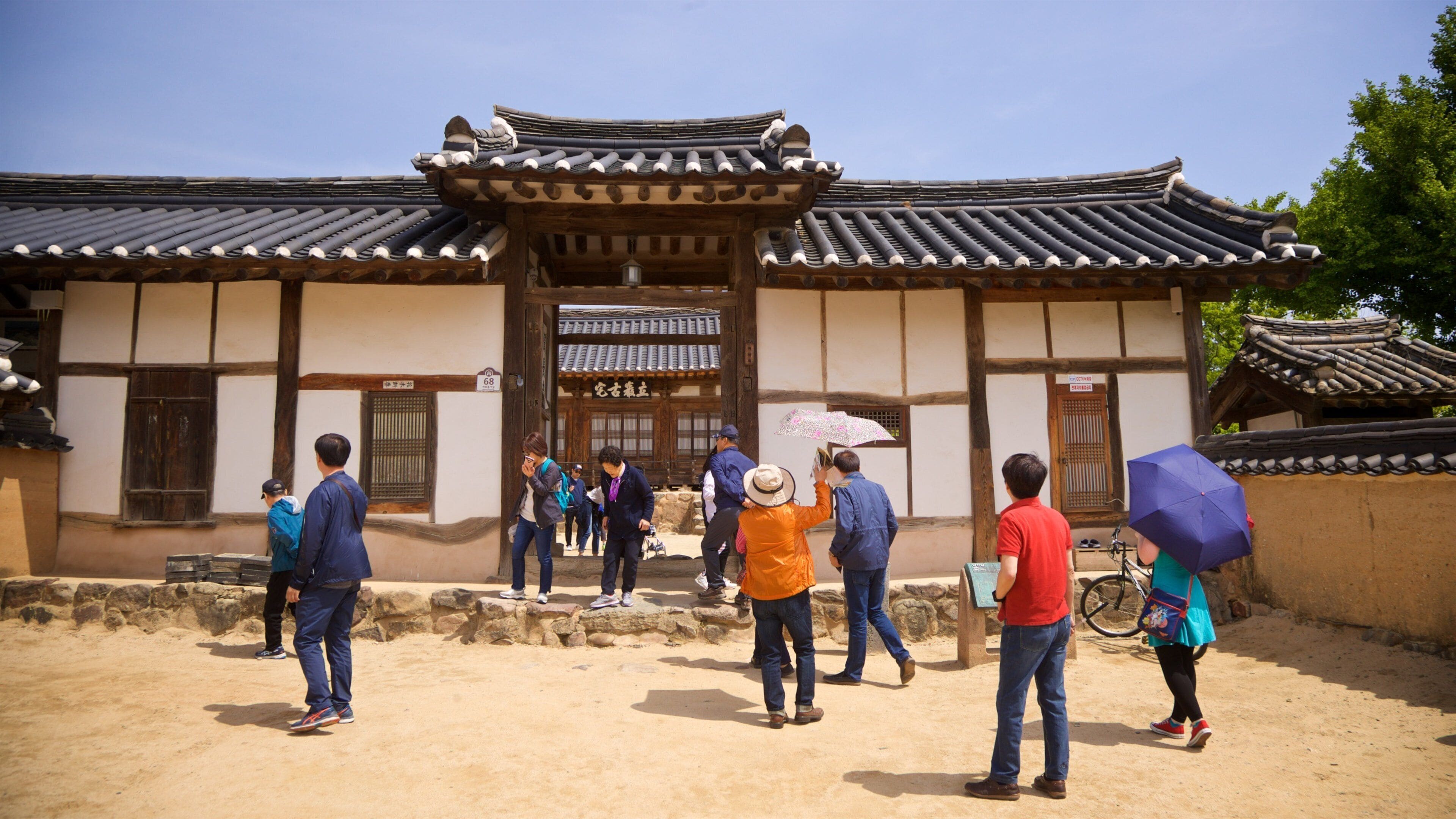 Andong Hahoe Folk Village which includes heritage elements and a small town or village as well as a small group of people