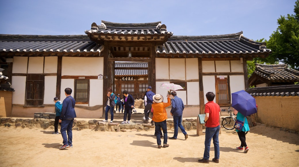 Andong Hahoe Folk Village which includes heritage elements and a small town or village as well as a small group of people