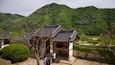 Byeongsanseowon Confucian Academy which includes tranquil scenes and heritage elements as well as a small group of people