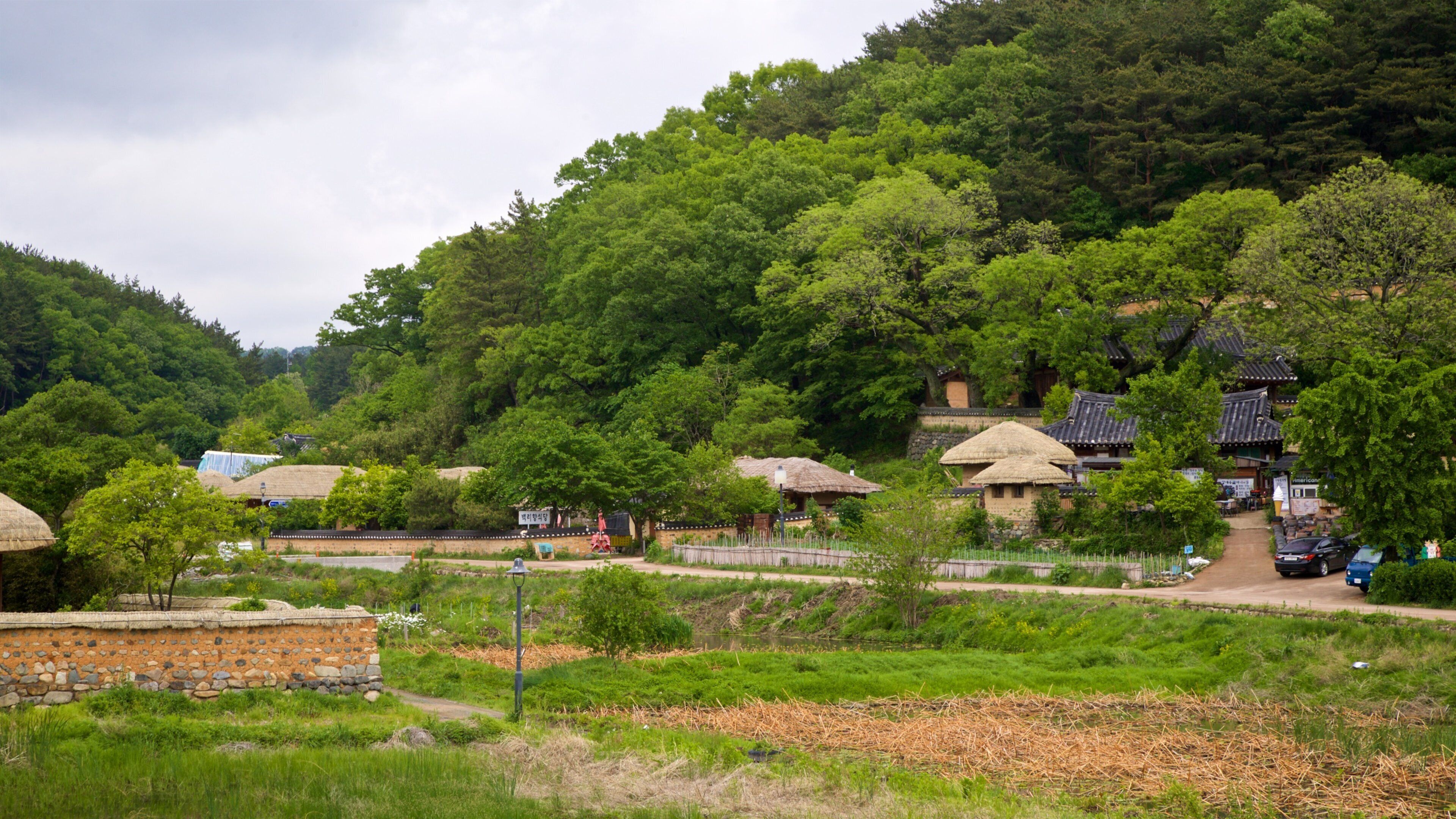 Yangdong Folk Village featuring a small town or village and landscape views