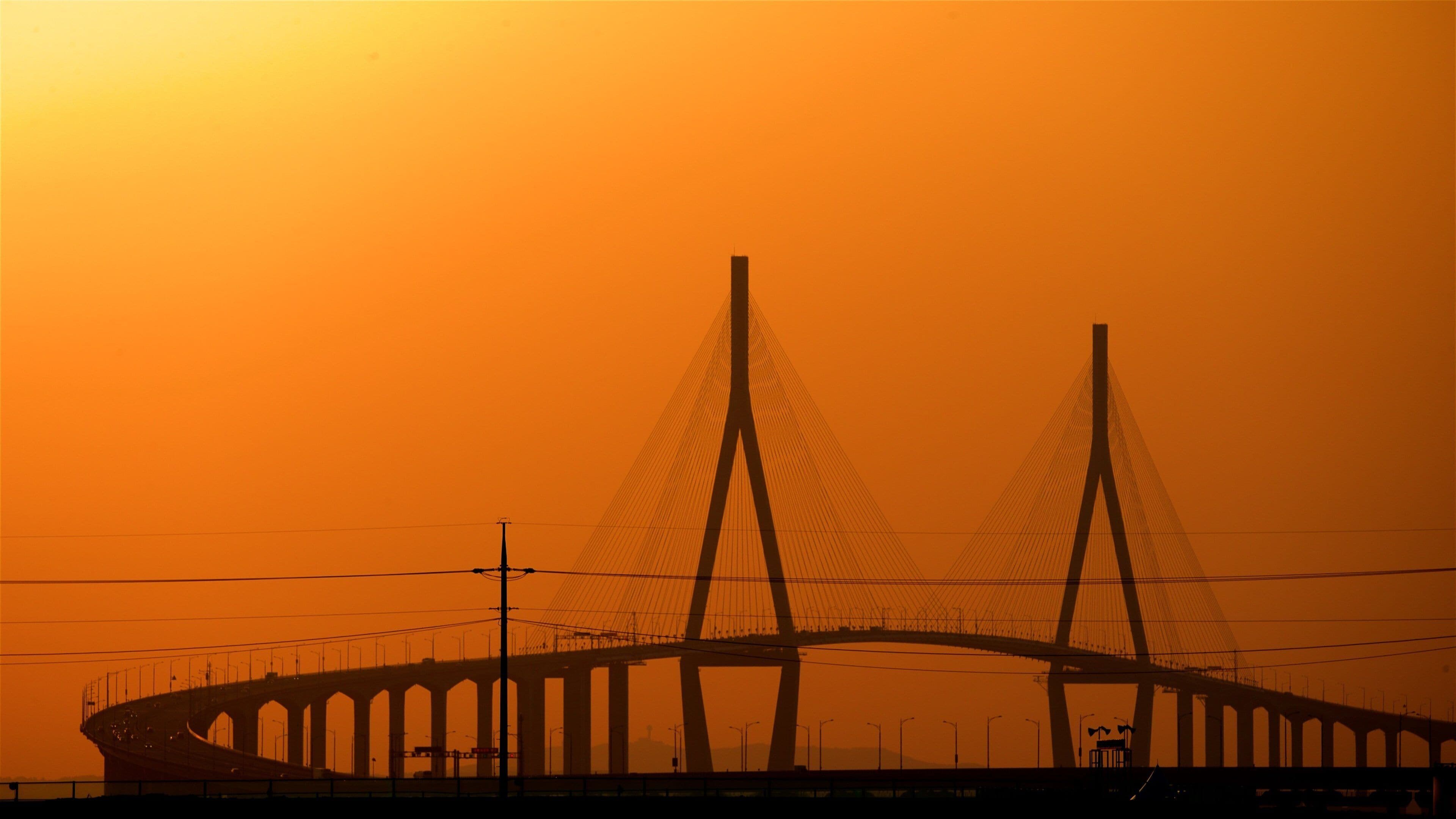 Incheon Bridge showing a bridge and a sunset