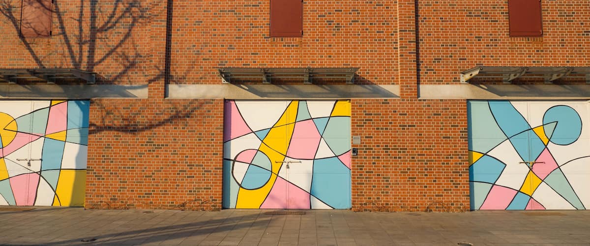 Pastel color metal door and brick wall at Art platform, Jung-gu, Incheon, Korea