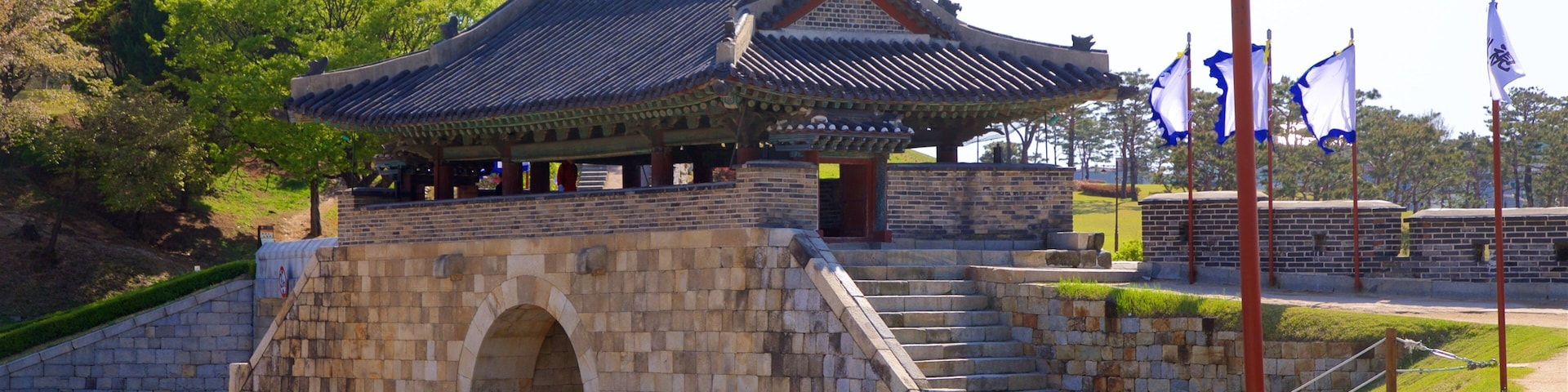 Hwaseomun Gate which includes a garden and heritage architecture