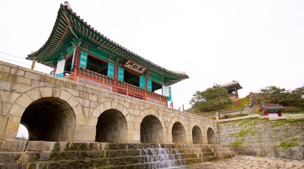 Hwahongmun Gate showing a bridge, heritage architecture and a river or creek