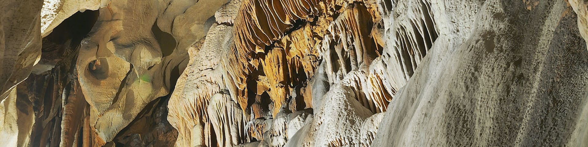 A cave with stalactites and stalagmites.