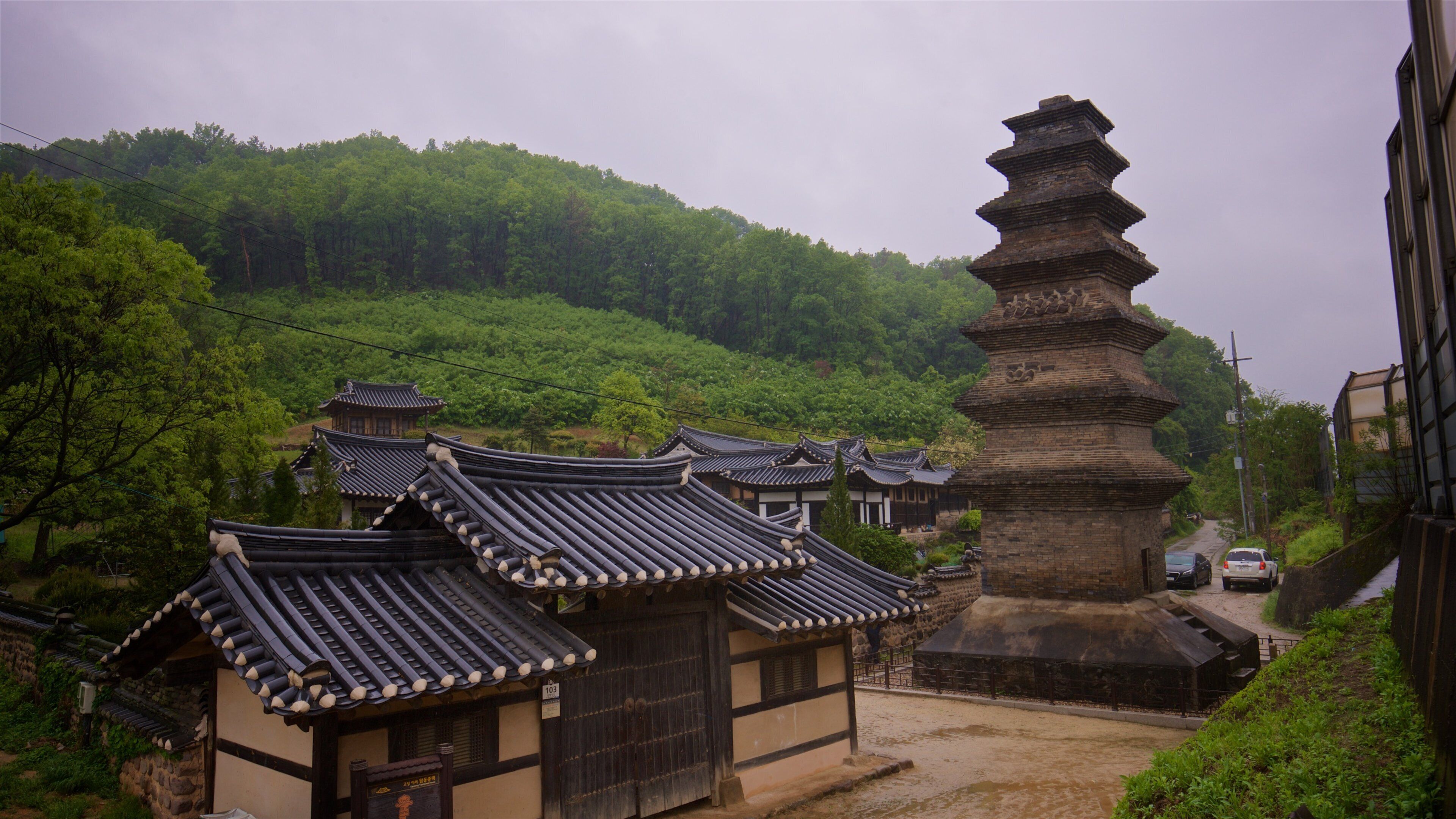 Seven-story Brick Pagoda in Sinse-dong showing a monument, heritage elements and a small town or village