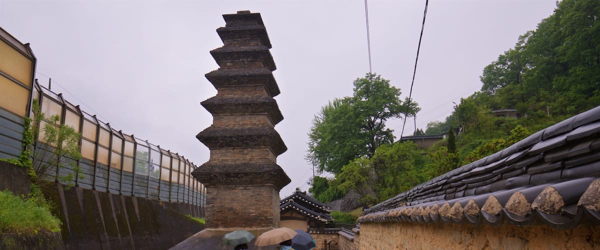 Seven-story Brick Pagoda in Sinse-dong which includes heritage elements and a monument as well as a small group of people