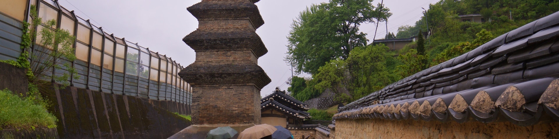 Seven-story Brick Pagoda in Sinse-dong which includes heritage elements and a monument as well as a small group of people