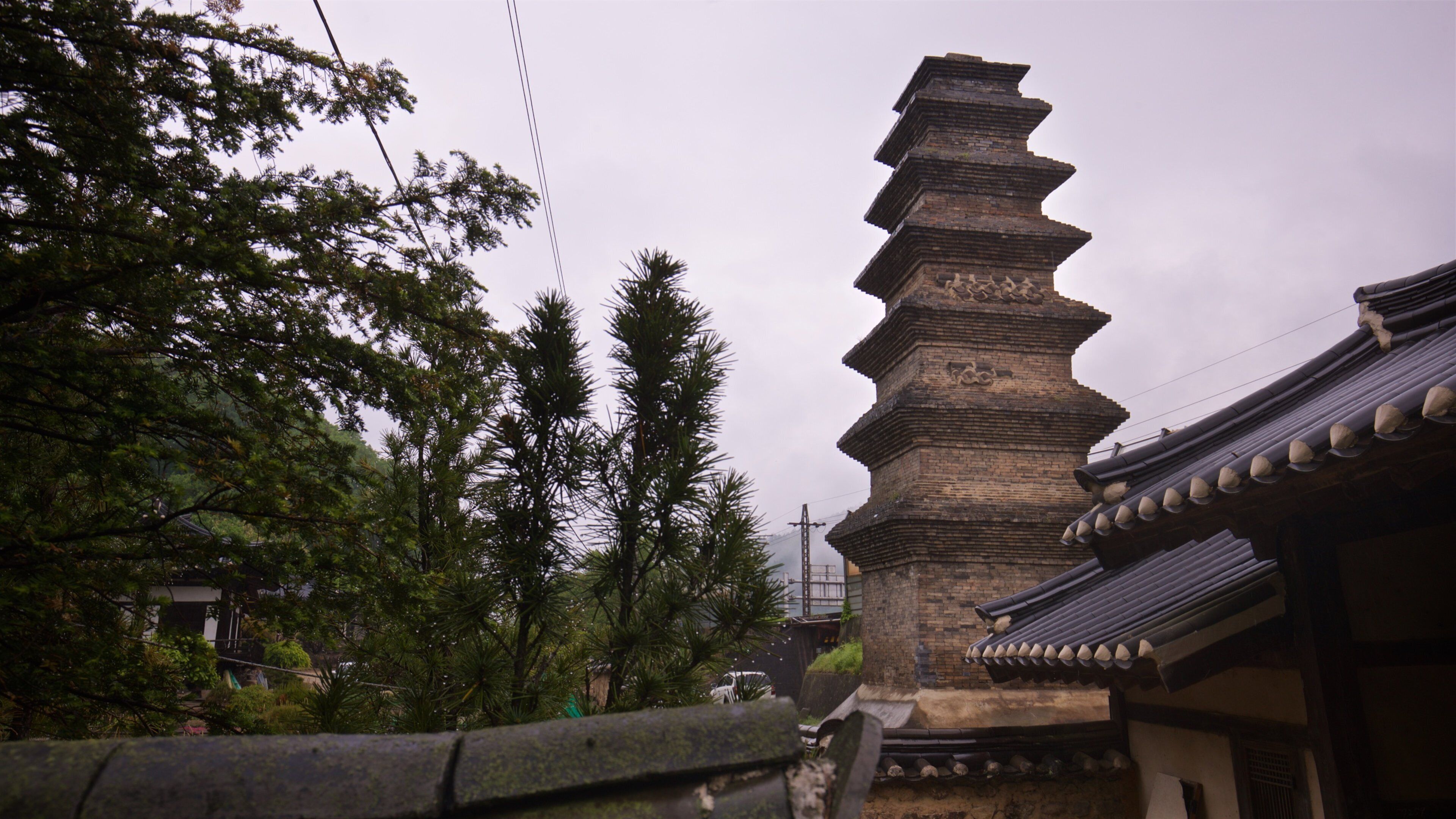 Sinsedong 7 stories Brick Pagoda which includes heritage elements, a small town or village and a monument