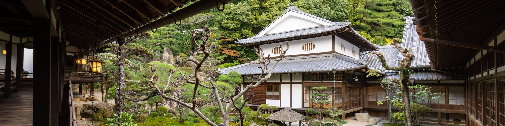 Saijoinari Temple featuring heritage elements, a park and a small town or village