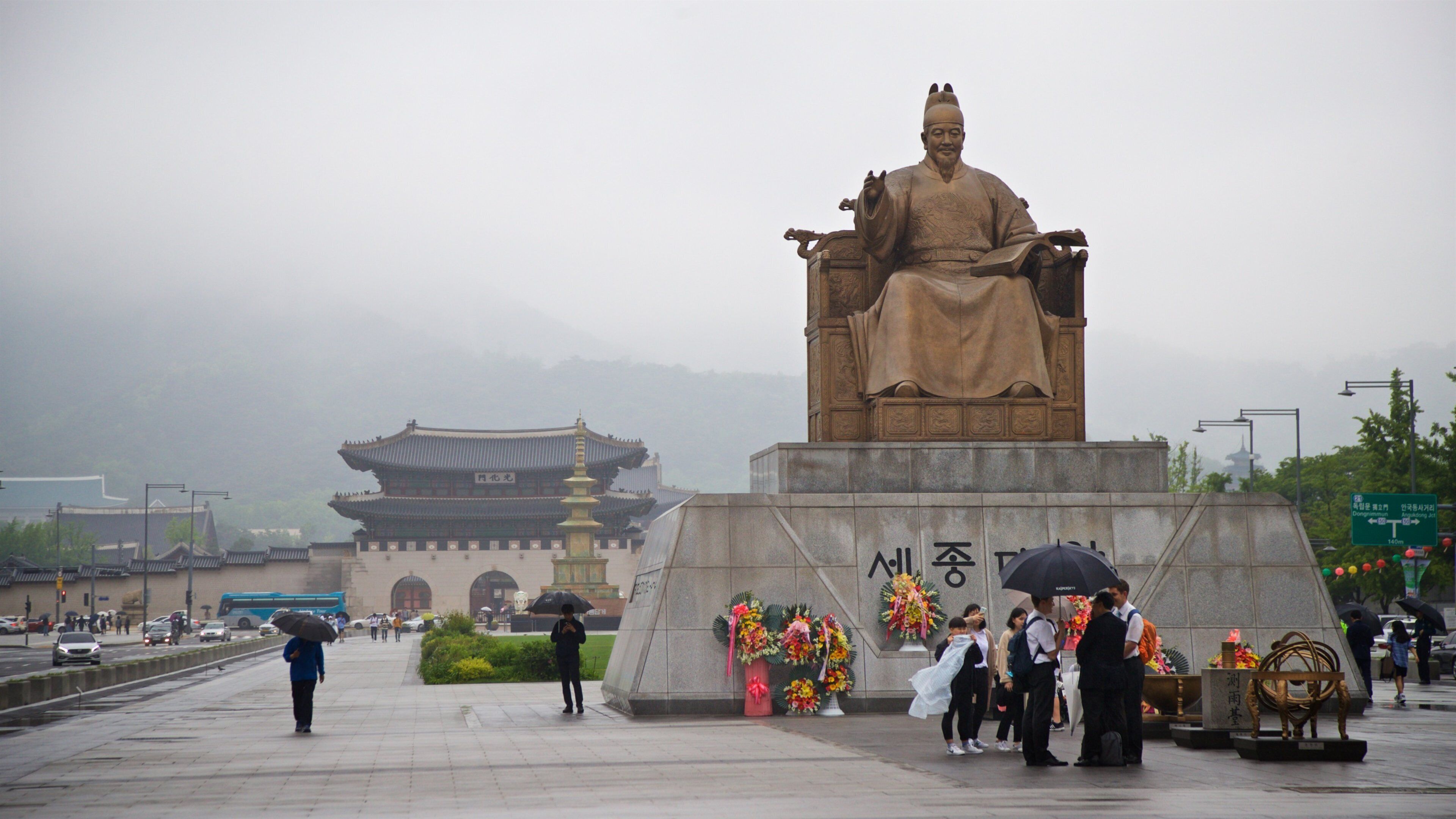 Statue of Sejong the Great showing heritage elements, a statue or sculpture and a square or plaza