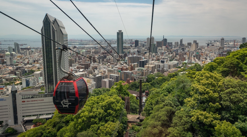 Shin-Kobe Ropeway showing a gondola, landscape views and a city