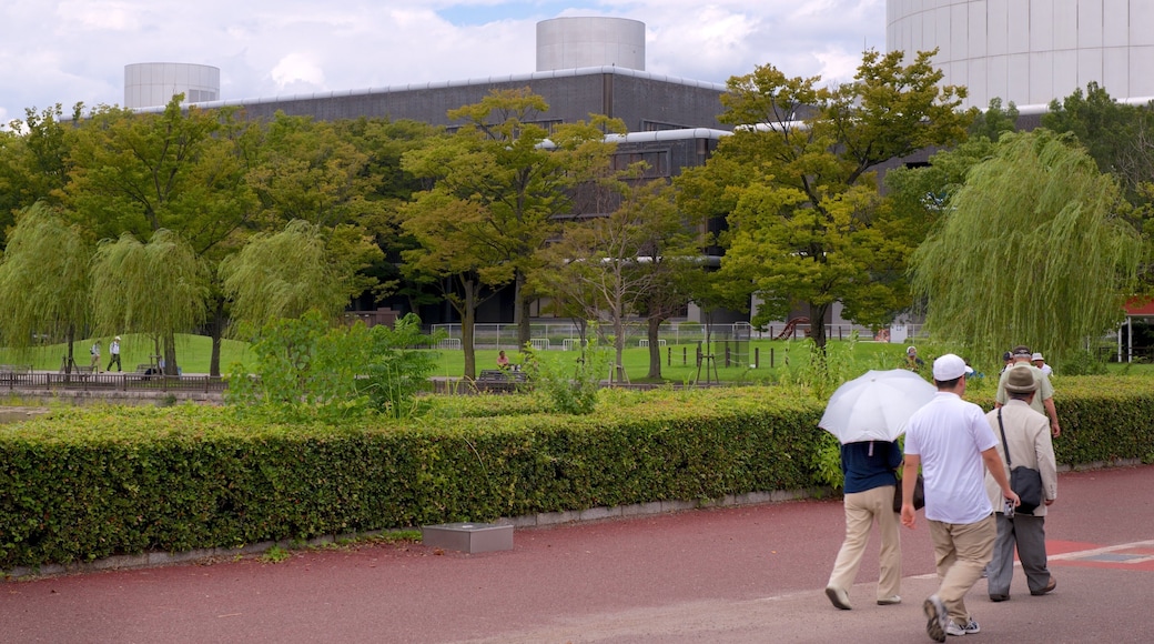 Japan featuring a park as well as a small group of people