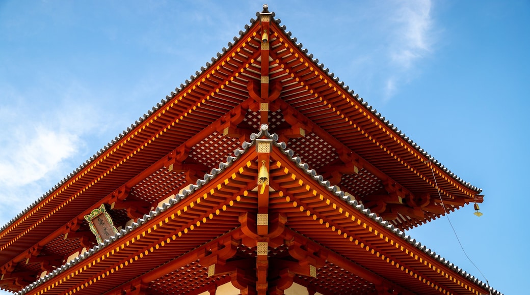 Suzakumon Gate featuring a temple or place of worship and heritage elements
