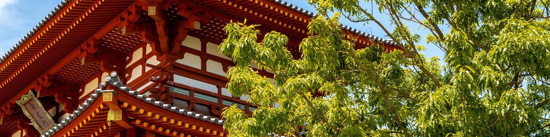Suzakumon Gate which includes heritage elements and a temple or place of worship