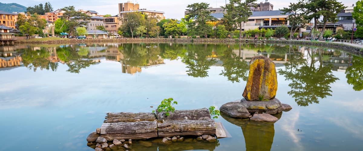 Sarusawa-ike featuring a lake or waterhole