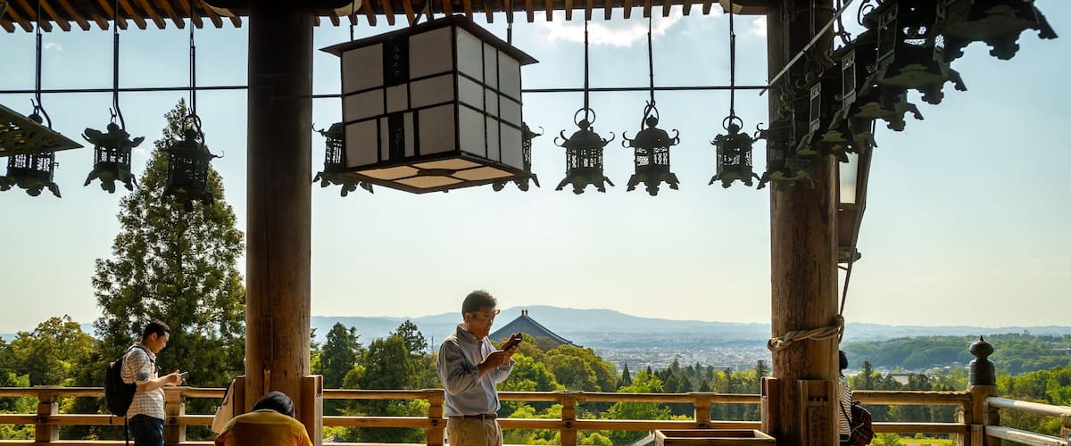 Nigatsu-do Temple featuring views as well as a small group of people
