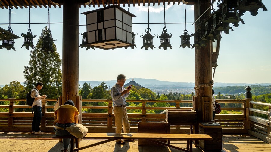 Nigatsu-do Temple featuring views as well as a small group of people