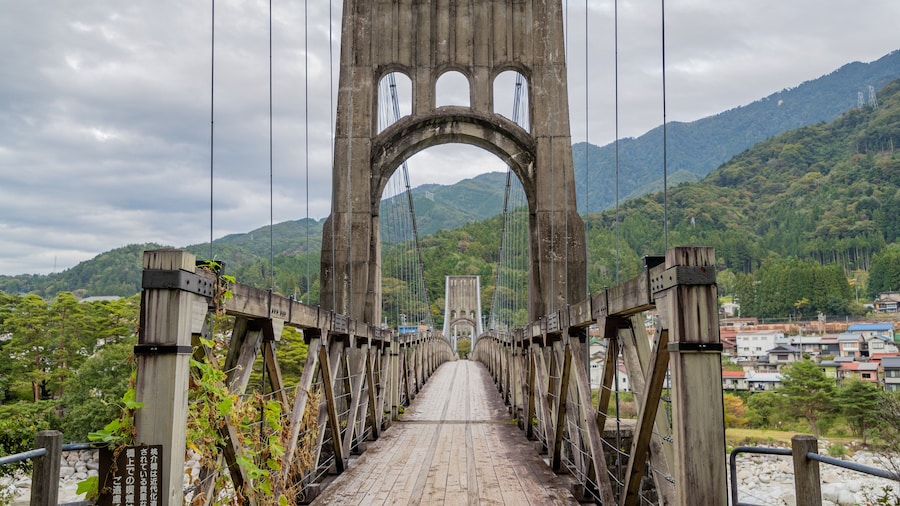 Momosuke Bridge featuring landscape views and a bridge