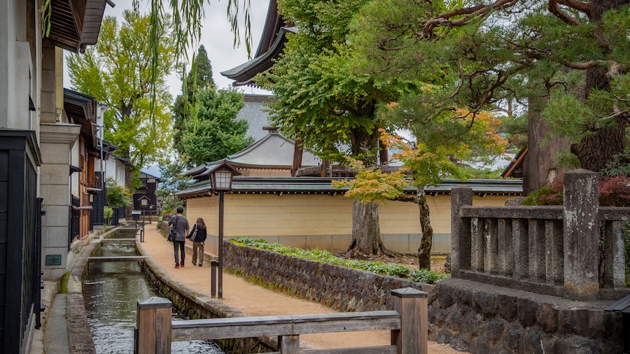 Shirakabe Dozogai showing a river or creek as well as a couple