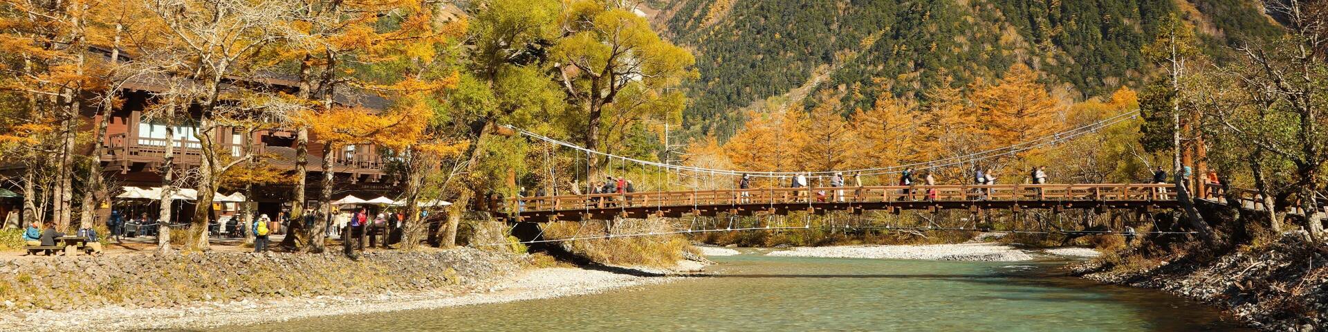 Kappa Bridge which includes a river or creek, a bridge and mountains