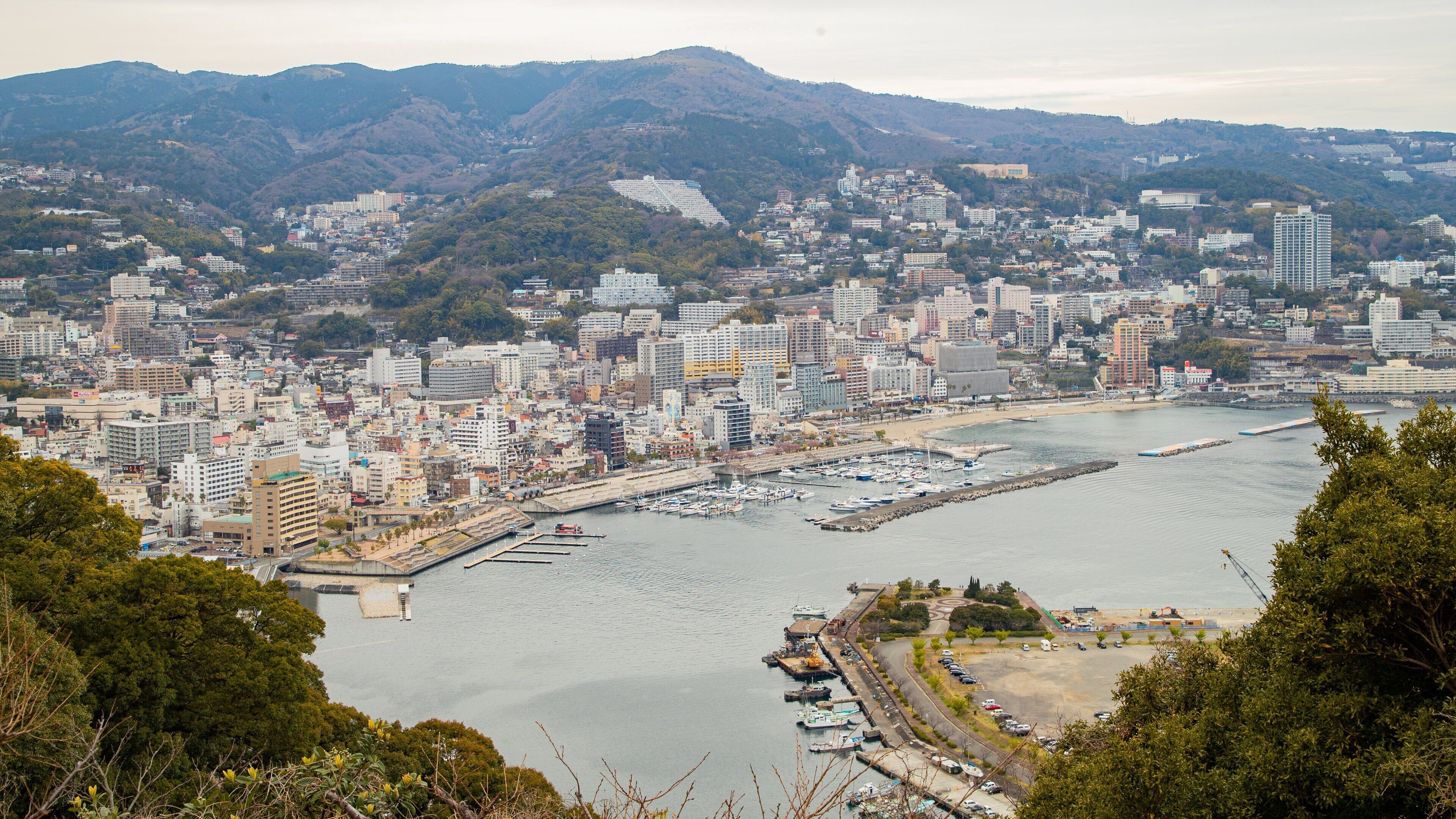 Atami Castle featuring a bay or harbor, landscape views and a city