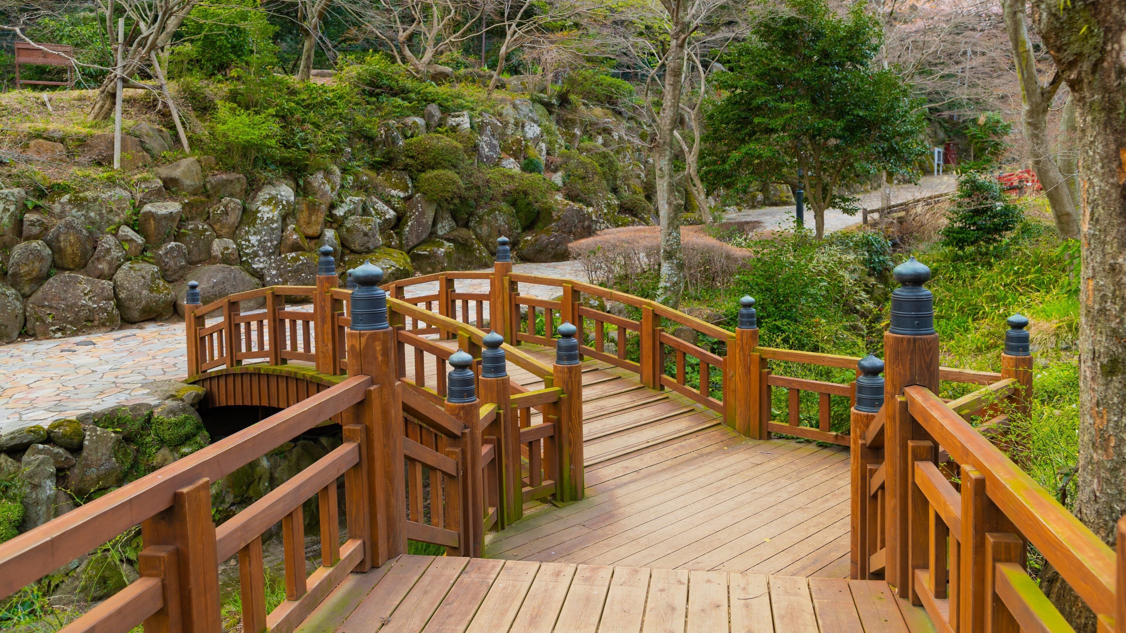 Atami Plum Garden featuring a garden and a bridge