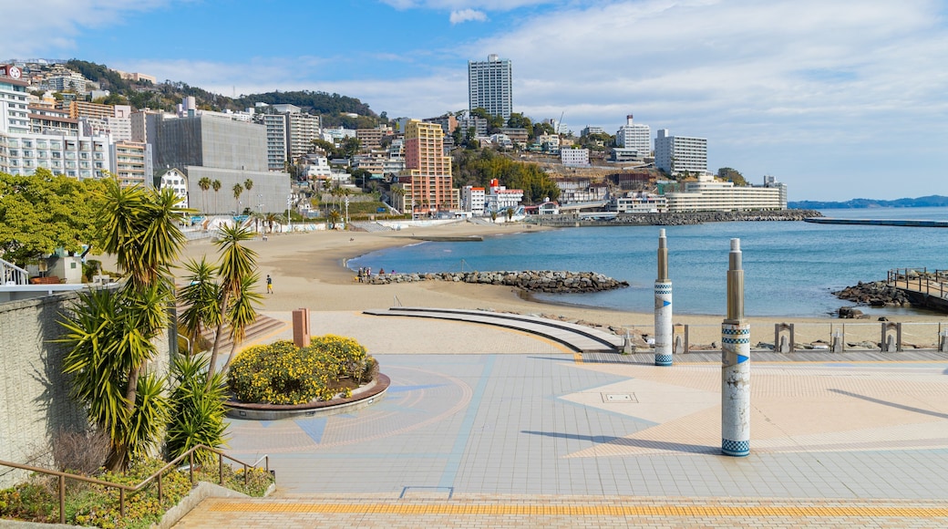 Atami Sun Beach showing a coastal town, general coastal views and a beach