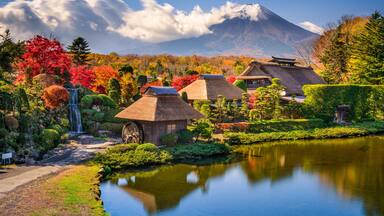 Mt. Fuji and Traditional Village in Oshinohakkai, Japan.
