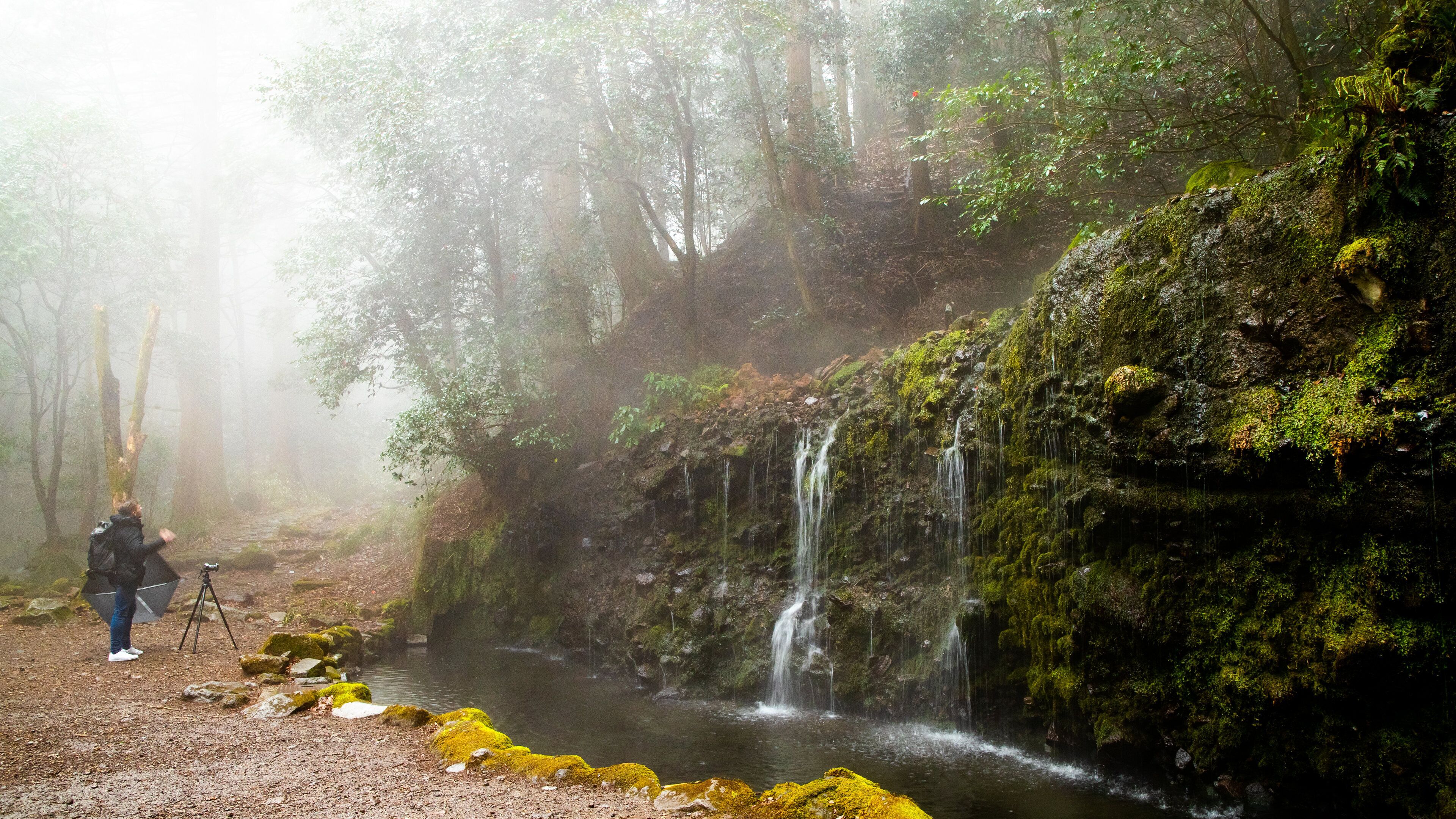 Chisuji Falls which includes mist or fog, a waterfall and a river or creek