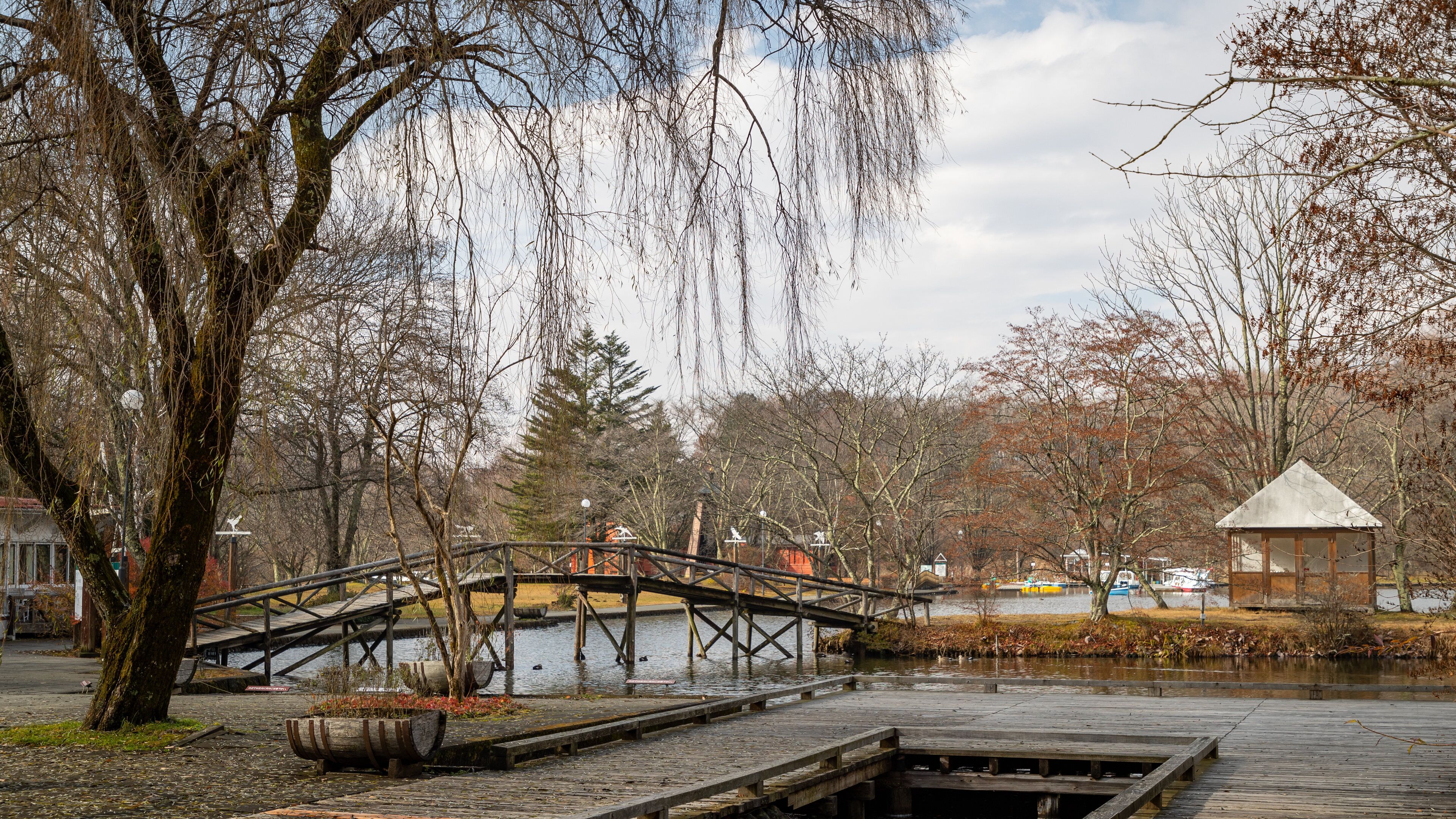 Karuizawa Taliesin featuring a bridge and a lake or waterhole