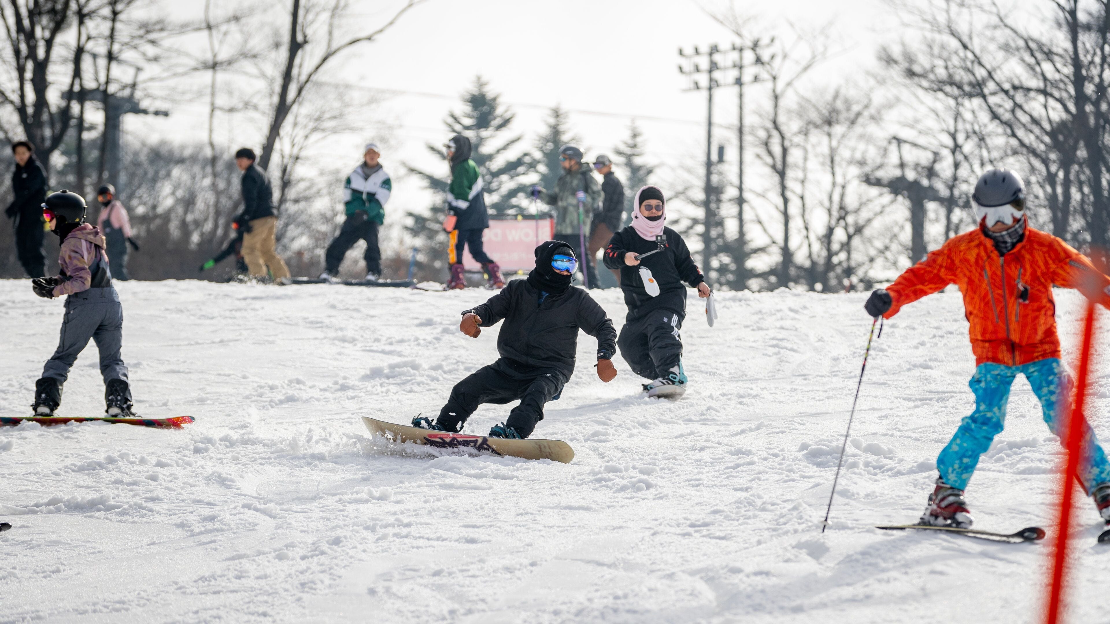 Karuizawa Prince Hotel Ski Resort showing snow and snow skiing as well as a small group of people