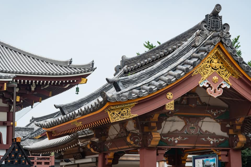 Traditional Asian architecture with ornate roofs and intricate designs.