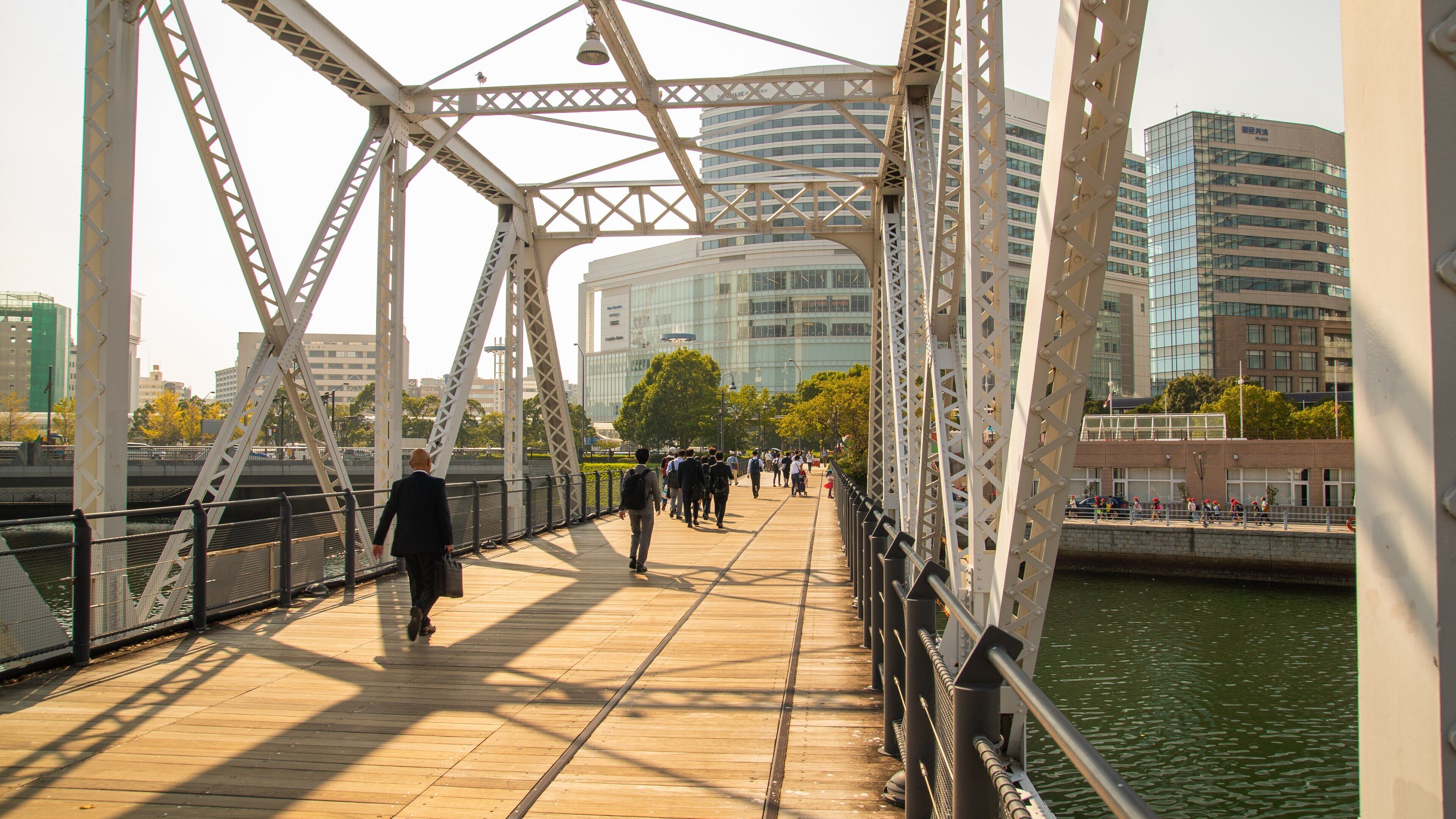 Kishamichi Promenade which includes a river or creek and a bridge