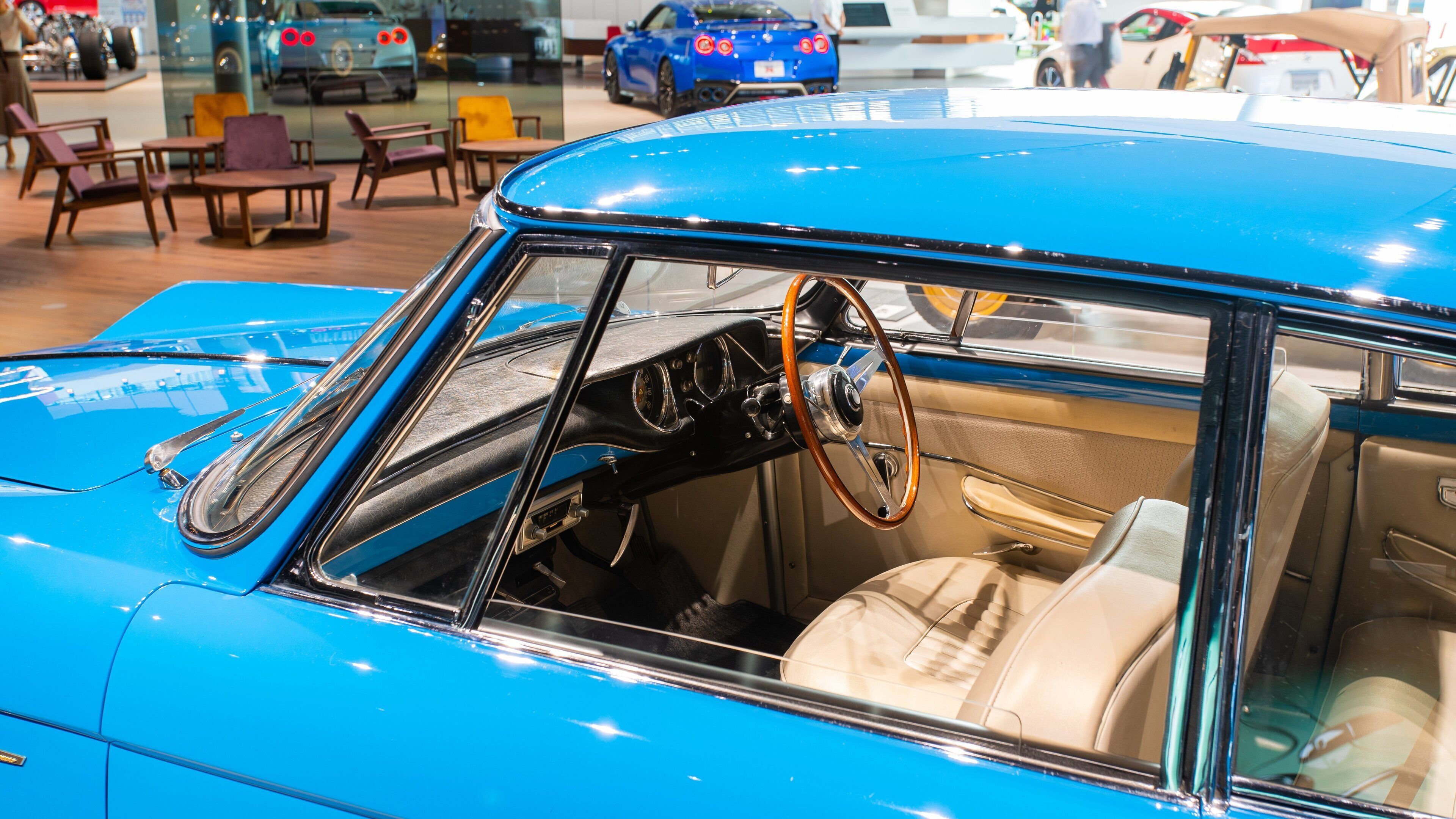 Nissan Global Headquarters Gallery showing heritage elements and interior views