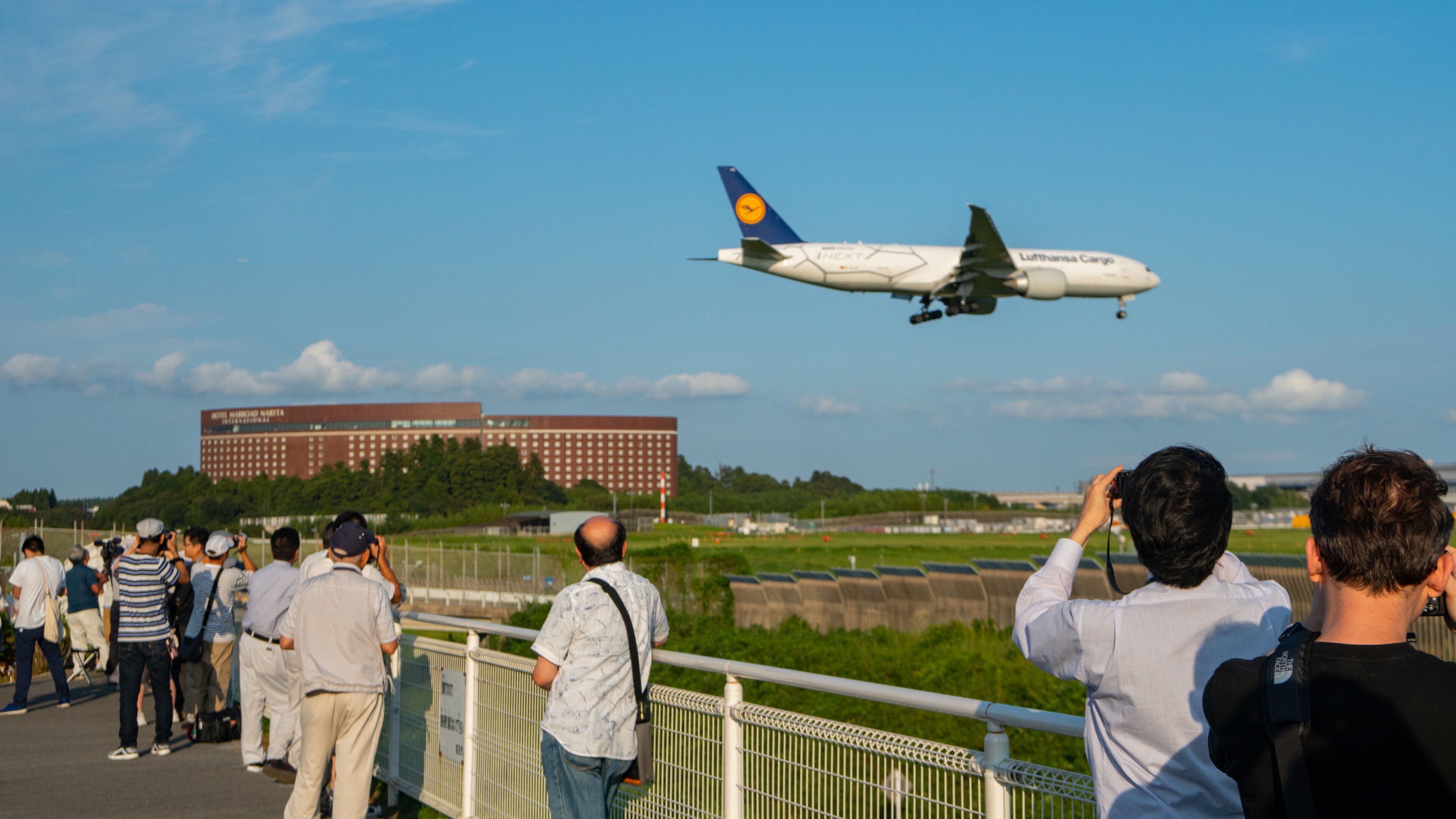 Sakura-no-Yama Hill which includes aircraft and views as well as a small group of people