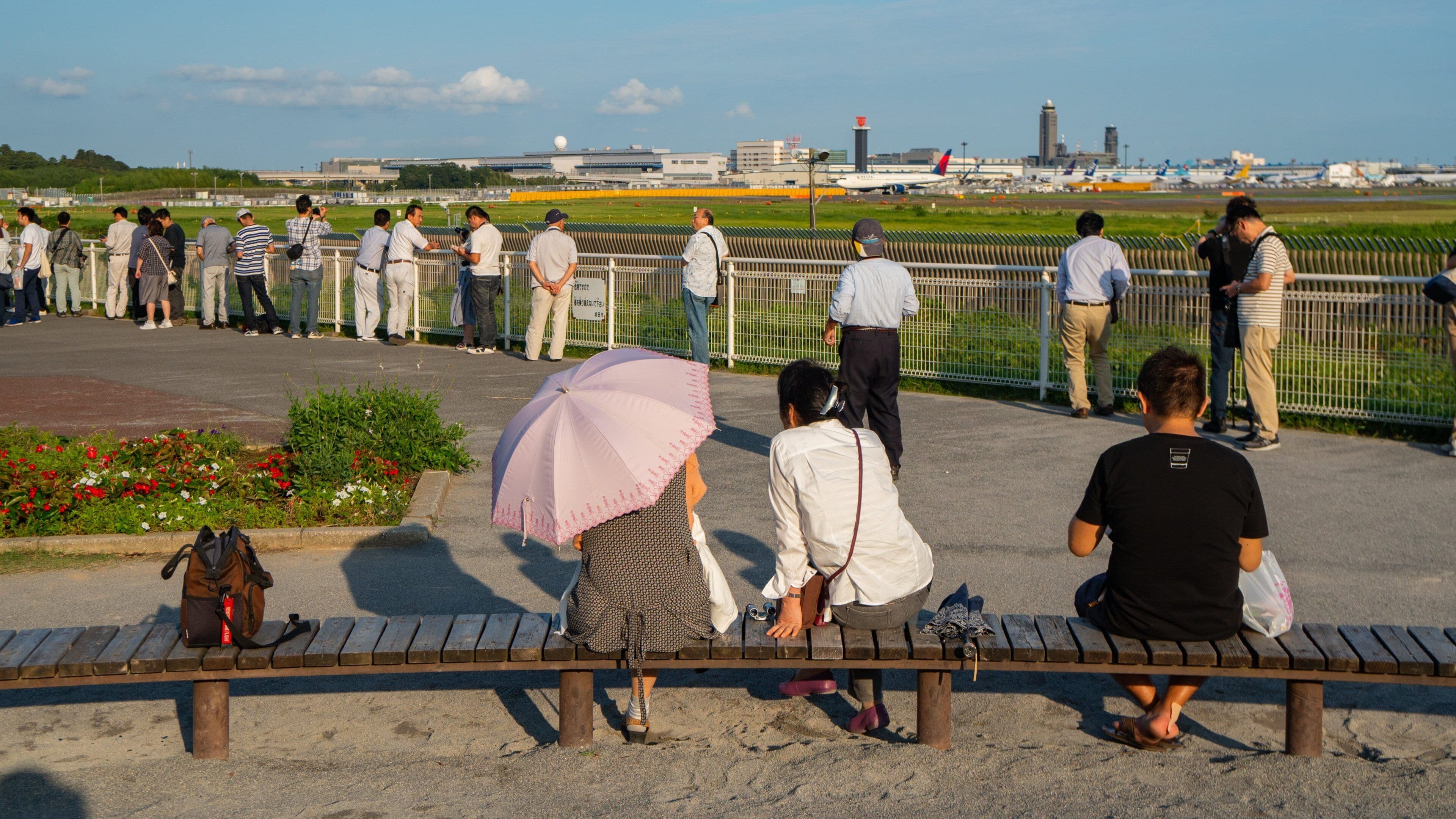 Sakura-no-Yama Hill which includes a park as well as a small group of people